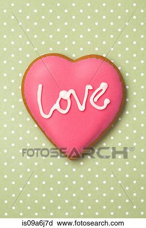 Stock Image - Decorated heart shaped cookie. Fotosearch
