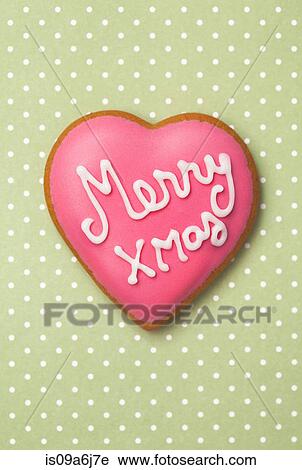Stock Image - Decorated heart shaped cookie. Fotosearch