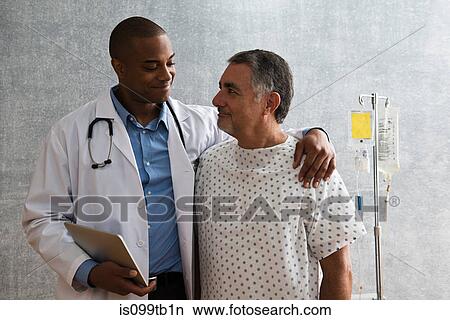 Picture - Doctor supporting patient. Fotosearch