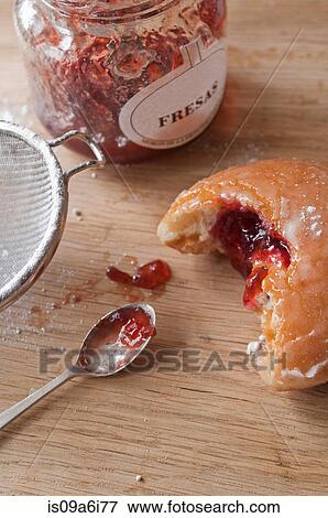 Doughnuts and jam on table View Large Photo Image Stock Photo - Doughnuts and jam on table. Fotosearch