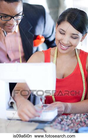 Dressmakers working in studio View Large Photo Image Picture - Dressmakers working in studio. Fotosearch