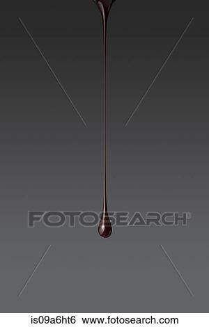 Stock Photograph - Drop of black paint. Fotosearch