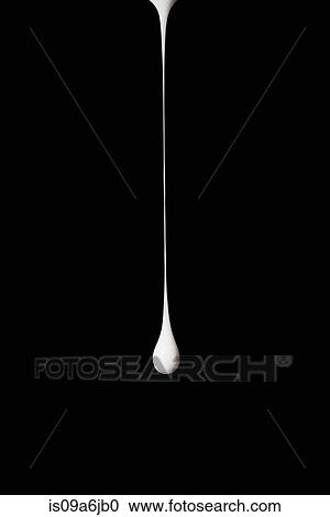 Stock Image - Drop of white paint. Fotosearch
