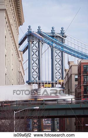 East River Bridge and urban buildings View Large Photo Image Stock Image - East River Bridge and urban buildings. Fotosearch