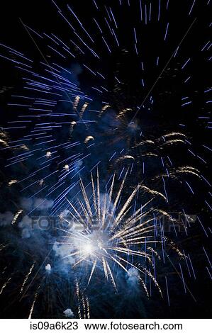Fireworks exploding in night sky View Large Photo Image Stock Image - Fireworks exploding in night sky. Fotosearch