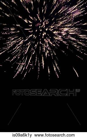 Fireworks exploding in night sky View Large Photo Image Stock Photo - Fireworks exploding in night sky. Fotosearch