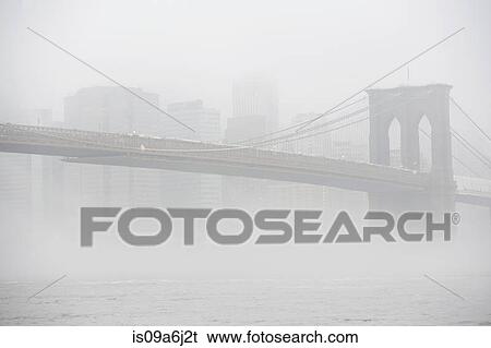 Fog rolling over Brooklyn bridge View Large Photo Image Stock Photograph - Fog rolling over Brooklyn bridge. Fotosearch