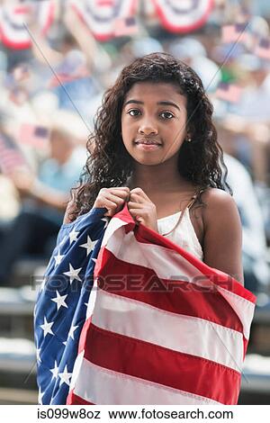 Girl at rally wrapped in american flag View Large Photo Image Stock Photo - Girl at rally wrapped in american flag. Fotosearch