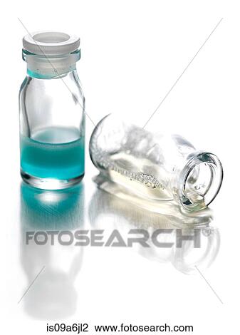 Stock Image - Glass bottles of liquid. Fotosearch