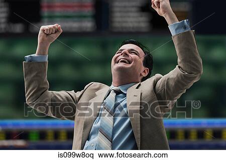 Happy businessman at stock exchange View Large Photo Image Stock Photography - Happy businessman at stock exchange. Fotosearch