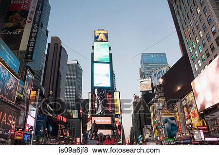 Stock Photo - Illuminated billboards in Times Square. Fotosearch