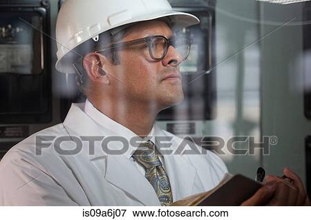 Industrial worker at switch board View Large Photo Image Stock Photo - Industrial worker at switch board. Fotosearch