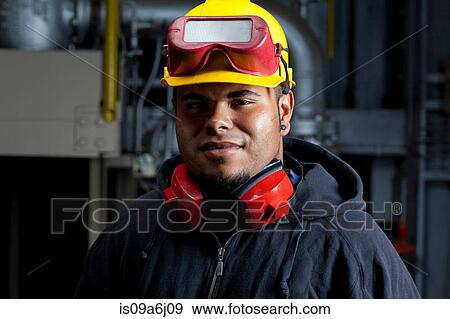 Stock Photo - Industrial worker in plant. Fotosearch
