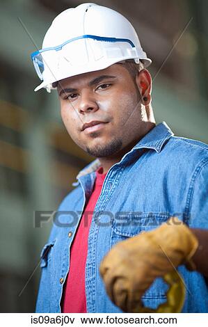 Industrial worker in plant View Large Photo Image Stock Photo - Industrial worker in plant. Fotosearch
