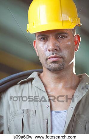 Stock Photo - Industrial worker in plant. Fotosearch