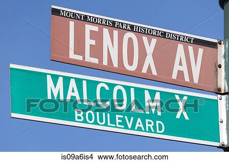 Picture - Lenox Avenue and Malcolm X street signs. Fotosearch