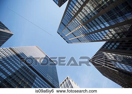 Stock Photograph - Low angle view of skyscrapers. Fotosearch