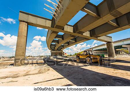 Stock Image - Machinery at construction site. Fotosearch
