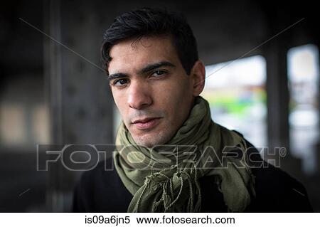 Stock Photography - Man wearing scarf outdoors. Fotosearch