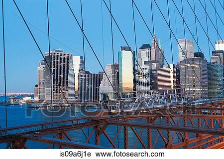 Stock Image - New York City bridge and skyline. Fotosearch