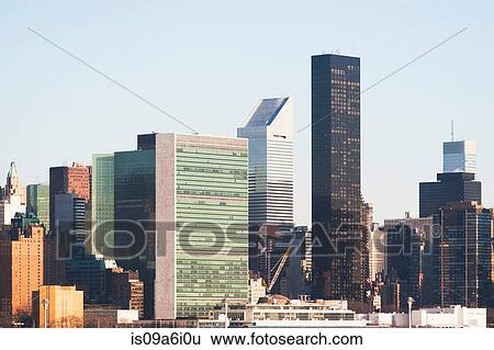 New York City skyline and cloudy sky View Large Photo Image Stock Photograph - New York City skyline and cloudy sky. Fotosearch