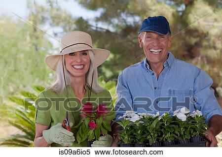 Stock Photography - Older couple gardening together. Fotosearch