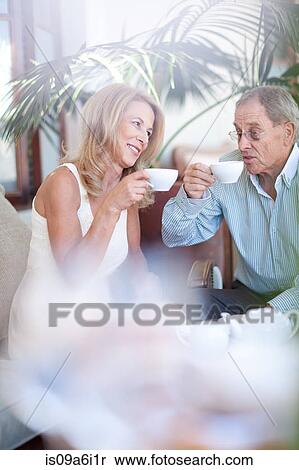 Stock Photography - Older couple having coffee together. Fotosearch
