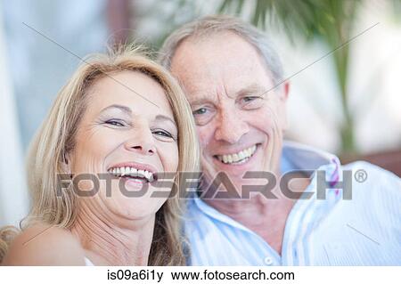 Older couple smiling together View Large Photo Image Stock Photo - Older couple smiling together. Fotosearch