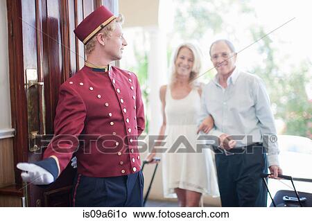 Older couple walking into hotel View Large Photo Image Picture - Older couple walking into hotel. Fotosearch
