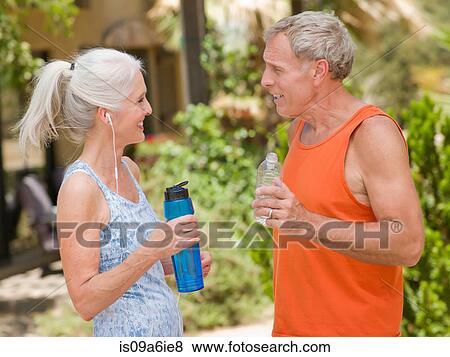 Stock Photo - Older couple working out together. Fotosearch
