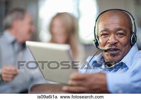 Older man wearing headset View Large Photo Image Stock Image - Older man wearing headset. Fotosearch