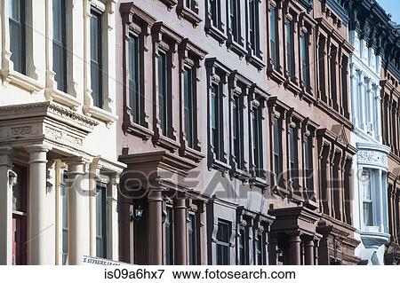 Ornate widows of apartment buildings View Large Photo Image Stock Photo - Ornate widows of apartment buildings. Fotosearch
