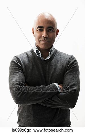 Portrait of businessman with arms folded View Large Photo Image Stock Image - Portrait of businessman with arms folded. Fotosearch