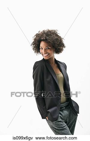 Portrait of businesswoman with hands in pockets View Large Photo Image Stock Photo - Portrait of businesswoman with hands in pockets. Fotosearch