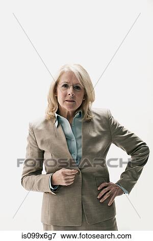 Portrait of mature businesswoman wearing glasses View Large Photo Image Stock Photo - Portrait of mature businesswoman wearing glasses. Fotosearch
