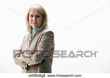 Stock Photo - Portrait of mature businesswoman wearing glasses. Fotosearch