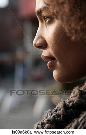 Stock Image - Profile view of woman's face. Fotosearch