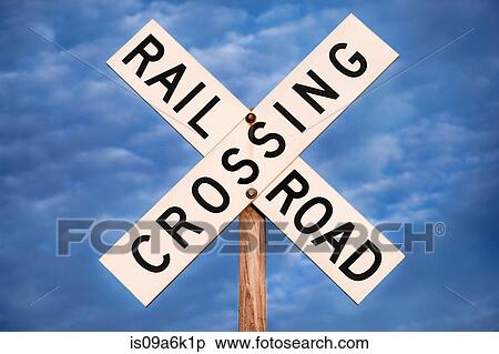 'Railroad crossing' sign under blue sky View Large Photo Image Stock Photography - 'Railroad crossing' sign under blue sky. Fotosearch