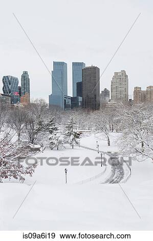 Road in snowy urban park View Large Photo Image Stock Photo - Road in snowy urban park. Fotosearch
