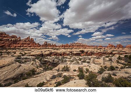 Rock formations in dry desert landscape View Large Photo Image Stock Photograph - Rock formations in dry desert landscape. Fotosearch
