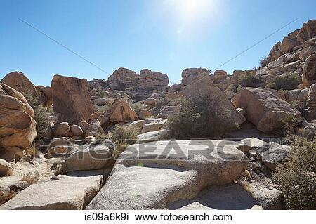 Stock Image - Rock formations in dry rural landscape. Fotosearch