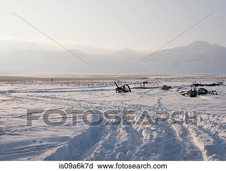 Rusted machinery in snowy field View Large Photo Image Stock Image - Rusted machinery in snowy field. Fotosearch