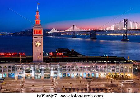 Stock Photo - San Francisco building and bridge at night. Fotosearch