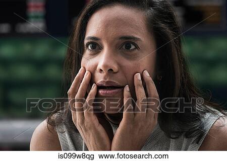 Shocked businesswoman at stock exchange View Large Photo Image Stock Image - Shocked businesswoman at stock exchange. Fotosearch
