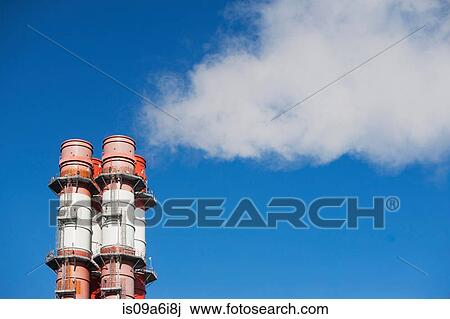 Smoke billowing from industrial plant View Large Photo Image Stock Image - Smoke billowing from industrial plant. Fotosearch