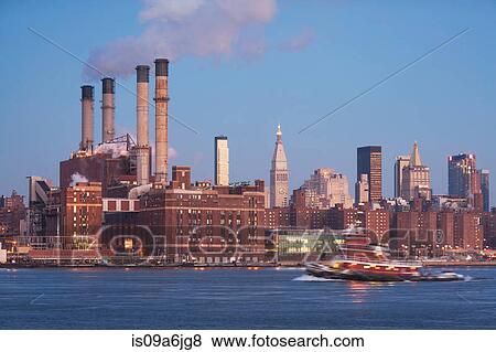 Smoke billowing from industrial plant View Large Photo Image Stock Photo - Smoke billowing from industrial plant. Fotosearch