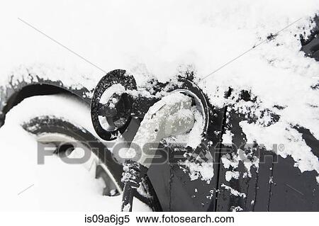 Snowy plug in electric car View Large Photo Image Stock Photography - Snowy plug in electric car. Fotosearch