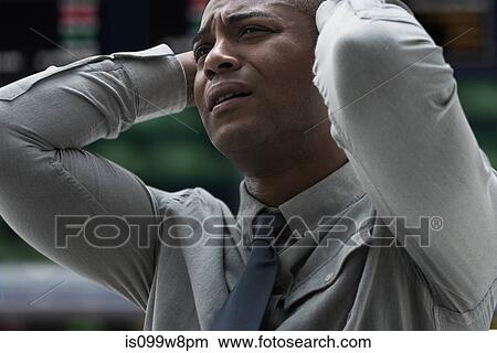 Stressed businessman at stock exchange View Large Photo Image Picture - Stressed businessman at stock exchange. Fotosearch