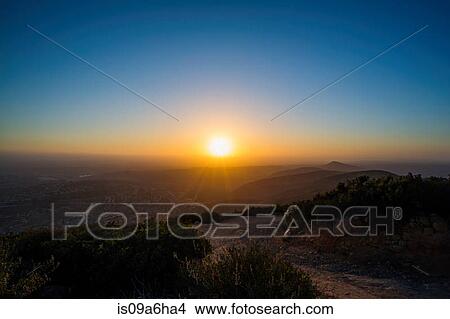 Picture - Sun rising over rural landscape. Fotosearch