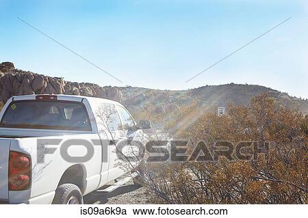 Truck parked on dirt road View Large Photo Image Stock Image - Truck parked on dirt road. Fotosearch